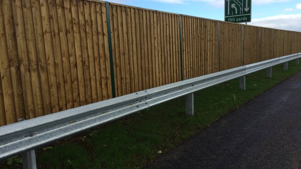 Acoustic reflective barrier